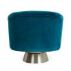 A luxurious blue velvet swivel chair with brushed stainless steel base