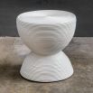 White side table with ribbed detailing in rattan