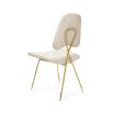 luxurious dining chair with linen blend upholstery and polished brass frame