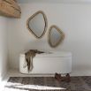 Cream bench in boucle finish with liftable top