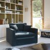 Comfortable armchair in peacock blue velvet