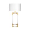 A contemporary acrylic and brass table lamp 