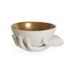 A luxurious hand-shaped bowl with gold interior detailing