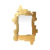 A stylish, geometric accent wall mirror in an antique brass finish 
