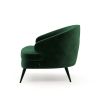 A luxurious retro-style velvet armchair with upholstered wooden legs by Laskasas