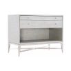 A contemporary bedside table with Raffia upholstery.