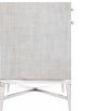 A contemporary bedside table with Raffia upholstery.