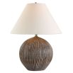 Illuminate your space with the Sayre Table Lamp, featuring a textured porcelain base in dark brown and a chic oatmeal linen shade for timeless elegance.