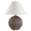 Illuminate your space with the Sayre Table Lamp, featuring a textured porcelain base in dark brown and a chic oatmeal linen shade for timeless elegance.