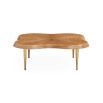 Solid oak coffee table with clover-like design.