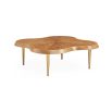 Solid oak coffee table with clover-like design.