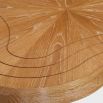 Solid oak coffee table with clover-like design.