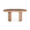 An extendable solid oak dining table.
