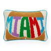 A bold and colourful cushion featuring hand embroidery and a velvet back