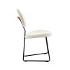 Stylish dining chair upholstered in white fabric with a sleek black frame