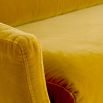 Stunning settee in Varese Lichen upholstery with sleek brass frame legs