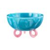 Dazzling blue bowl with round pink base detail. 