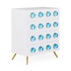 Playful and contemporary 4-drawer chest with blue orbs and brass details