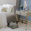 An elegant one drawer bedside table by Bernhardt with a glamorous glimmering base and an ash grey veneer finish