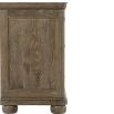 A peppercorn finished bedside table with 3 drawers