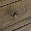 A peppercorn finished bedside table with 3 drawers