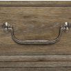 A peppercorn finished bedside table with 3 drawers