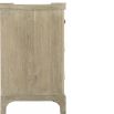 A 4 drawer bedside table in a sand finish