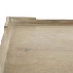 A 4 drawer bedside table in a sand finish