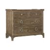 A dark featured bedside table with four drawers