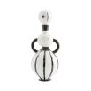 A stylish decanter by Jonathan Adler with a curvaceous silhouette and gold accents