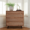 Wooden chest of four drawers with rattan drawers