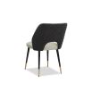 Elegant dining chairs with light grey velvet upholstery and quilted dark grey back