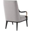 Grey armchair with brass accents, black legs and frame