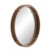 Leather round mirror with brass accents and round mirror glass