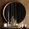 Leather round mirror with brass accents and round mirror glass