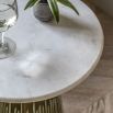 Round, marble topped side table