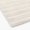 Cosy cream rug with discreet curve and line pattern