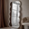 Full length mirror with a wavy edge detailing