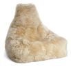 A sumptuously soft and snuggly bean bag chair made from New Zealand Sheepskin