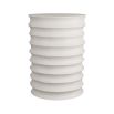 Drum-shaped side table created in white brush strokes