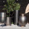 A beautiful burnished brass metal planter