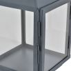 A beautiful, square shaped lantern with a powder-coated grey finish and woven rustic handle