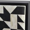 Geometric, black and white pattern drinks cabinet with gold accents