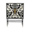 Geometric, black and white pattern drinks cabinet with gold accents