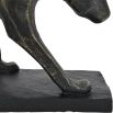A statement sculpture of a leopard with a textured bronze finish 