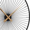 Mesmerising wall clock with delicate iron spokes and gold clock hands