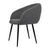 curvaceous and dark grey upholstered dining chair 