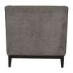 Cosy armchair with deep buttoning on the backrest and grey upholstery