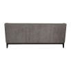 Luxury grey sofa with deep studding details and curved arms