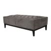 Elegant ottoman with deep buttoning detail on the seat